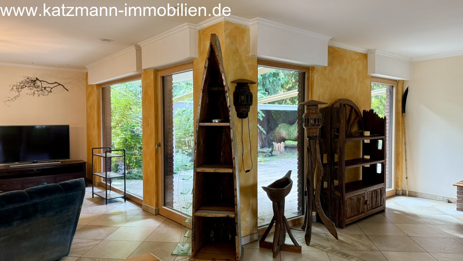 Bright living environment with floor-to-ceiling panoramic windows and direct garden access